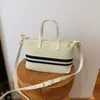 2026 Bolso de Paja Rayado Nuevo Estilo Marinero Bolso Tejido Hueco Bolso de Playa Bolso de Hombro Tote para Mujer Bolso de Mano Pequeño