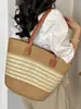 Elegante bolso de paja de gran capacidad, nuevo bolso tejido de verano 2026, bolso de hombro y para el antebrazo, moderno bolso de mujer a rayas