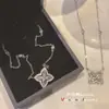 Anel Versa Sandalwood Key Estilo Igual para Homens e Mulheres Banhado a Ouro Micro Incrustação Zircônia Brilhante Europeu e Americano cuic Luxo Leve Pingente Seiko