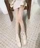Medias de Red Falsas de Muslo Alto Patchwork Hasta la Rodilla Pantimedias Blanco y Negro Encaje Gradiente Femeninas Primavera/Verano Delgadas Oscuras JK Falso Muslo