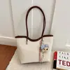 Bolsos de moda con estampado de leopardo para mujer en otoño e invierno 2026: Nuevos bolsos de hombro y tote casuales, de gran capacidad y versátiles para el trabajo.