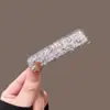 Diseño de pinza para el pelo con borla sentido de diseño nicho pinza BB exquisita moderna sentido de alta gama nuevo estilo chino pinza para el pelo pinza de pico de pato Yiwu al por mayor