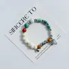 Pulsera de Cerámica Jingdezhen Nueva Historieta China Pulsera Boutique Venta al por Mayor Estudiante Joker Explosiones Puesto del Mercado Nocturno Pulsera