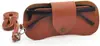 Estuche para gafas de sol de cuero suave para colgar del cuello, bolsa para gafas portátil antigolpes ultradelgada, adecuada para deportes y ciclismo, disponible en varios colores