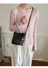Bolso tejido de nicho súper popular transfronterizo para mujer, nuevo bolso cruzado versátil de moda 2026, bolso de mano pequeño, bolso tipo cubo para teléfono