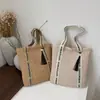 Bolsa Grande de Tecido para Mulheres 2026 Nova Primavera e Verão Versátil Grande Capacidade Ombro Praia Bolsa Balde para o Dia a Dia