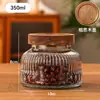 Pote Selado com Relevo Vintage Garrafa de Barriga Grande Pote Redondo Doméstico para Armazenamento Embalagem de Grãos Garrafa de Vidro Transparente Garrafa Vazia Venda por Atacado