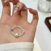 Anillo de Azúcar Azul Cubo Perla con Cuentas Semilla Iridiscentes, Banda Elástica, Suave y Fresco, Versátil para el Uso Diario para Niñas