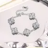 Juego de joyería de trébol de cuatro hojas, acero de titanio, oro real de 18 quilates, pulsera grabada, collar, pendientes, juego de tres piezas de trébol de cuatro hojas, entrega transfronteriza