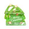 Uma variedade de sacolas de presente de Natal, sacolas de presente para as festas, sacolas de doces e biscoitos para a véspera de Natal, sacolas de presente de mão
