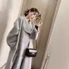 Abrigo de lana gris para mujer con cuello alto, estilo Hepburn, nuevo modelo otoño e invierno 2026, botones dorados, abrigo de lana de alta gama