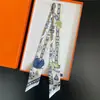 Bufanda de corbata estampada delgada de nuevo estilo para mujer, bufanda larga estrecha de seda estilo coreano para combinar con camisas, accesorio envolvente de moda