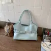 Bolso de mano casual de gran capacidad para mujer, nuevo y moderno de la primavera 2026, exquisito, de lujo ligero, para el hombro y cruzado diario