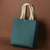 Bolsa de compras não tecida com fivela loja de roupas loja de óculos sacola de compras para saquinhos de chá sacola de presente impressão de LOGOTIPO outras tecelagens