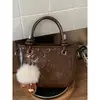 Bolso cubo de moda y sencillo para mujer, gran capacidad, nuevo de la primavera 2026, elegante estilo vintage, para el trabajo y los desplazamientos, bolso de hombro