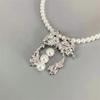 Collar de perlas con lazo para chica cool dulce y sexy de moda personalizada estilo nicho europeo y americano
