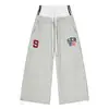 Fabricante Original Retrô Americano Calça de Moletom Patchwork com Letras de Cintura Dupla Unissex Perna Larga Solta Costa Oeste