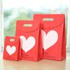 Bolsa de hebilla de retorno de boda roja Día de San Valentín amor Voltear bolsa de regalo de papel cálido Moda bolsa de dulces de boda