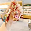 Lindo creativo bebida té con leche sostener tortuga capibara muñeco llavero colgante de bolsa llavero para llaves de coche pequeño regalo