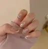 Puntas de uñas para manicura de agua pura, puntas de uñas ponibles con ojo de gato nude y diamantes, de alta gama, puramente hechas a mano, venta al por mayor de fábrica de productos terminados