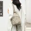 Mini Mochila 2025 Nueva Simple Versátil Antirrobo Bolso de Pecho para Mujer Moda Tela Oxford Casual Mochila Pequeña