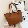 Bolso tote minimalista de gran capacidad transfronterizo, cuero suave, bolso de hombro de moda para el trabajo, bolso de mano multicapa, al por mayor para exportación, bolso para mujer