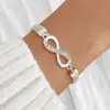 Novo conjunto de pulseiras com figura 8 infinito cravejado de diamantes, transfronteiriço europeu e americano, joias da moda em liga metálica simples retrô criativa, atacado