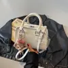 Bolso Pequeño de Alta Gama para Mujer 2025 Nuevo Primavera y Verano Versátil Bolso de Hombro Cruzado Estilo Caliente Súper Popular Bolso Cuadrado Pequeño de Mano