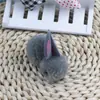 Pin de conejo lindo de peluche bola de pelo accesorios para el cabello joyería coreana de alta gama bola de pelo diy accesorios para el cabello para niños
