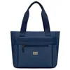 Exportação Transfronteiriça 2025 Nova Bolsa de Almoço para Escritório Moda Casual Bolsa de Mão Feminina Simples Grande Capacidade Bolsa de Tecido