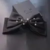 Acessórios de cabelo da Coreia do Sul atacado tecido laço grande grampo de cabelo feminino clipe de nuca clipe horizontal clipe de mola para rabo de cavalo adorno de cabeça