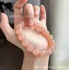 Pulsera de raíz de loto de jade de seda dorada natural directa de fábrica rosa, pulsera de cuentas rosa hielo, pulsera de cuentas redondas rosa toronja al por mayor