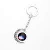 Llavero colgante con gema de tiempo y espacio, estilo europeo y americano, con forma de estrella hueca y luna, adornos colgantes que combinan con todo.