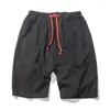 Shorts Masculino de Verão Novo Cruzamento Algodão e Linho Shorts de Cinco Pontos Tamanho Grande Solto Casual Cintura Elástica Cordão Shorts de Praia