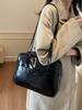 Bolso de axila estilo vintage de alta gama para mujer 2026 Nueva moda Versión coreana Mochila Mochila casual de gran capacidad