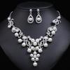 Juego de collar y aretes de gema artificial elegante de nueva moda europea y americana para mujer, aleación galvanizada, exclusivo transfronterizo, cadena para clavícula