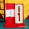 Traje de regalo de sándalo creativo cultural pluma de firma caja de regalo con tallado conmemorativo logo del traje pluma de gel de latón para negocios en stock