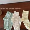 Calcetines Huhu de leche a rayas multicolor finos para rizar a media pantorrilla otoño e invierno calcetines japoneses suaves calcetines de felpa para mujer estudiante venta al por mayor
