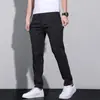 Pantalones casuales de envío directo para hombre Xintang, corte recto holgado para hombre, estilo delgado para primavera y verano, pantalones rectos versátiles de marca de moda