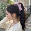 Presilha de banana moderna e estilosa para mulheres, versátil para o uso diário, presilha de cabelo de alto valor com bolinhas, acessório de cabelo simples de garra com laço estilo coreano