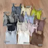 8201 # Top de moda de cachemir estilo coreano para principios de otoño con un hermoso diseño en la espalda, estampado de rayas, sujetador incorporado y sin necesidad de usar un sujetador aparte