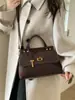 Bolsa Satchel de Camurça Retrô para o Dia a Dia de Mulheres 2025 Nova Tendência Moda Bolsa Kelly de Alto Padrão Grande Capacidade Bolsa Platina