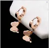 Arete de oreja Corea del Sur aretes de oro rosa con temperamento versión femenina temperamento esmerilado personalidad linda mariposa aretes de acero de titanio regalo