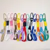 Llavero de Cuerda para Mochila al Aire Libre Cordón Trenzado de Nylon Mosquetón Cuerda de Mano para Pareja Lanyard para Bolsa Muñeco Popular