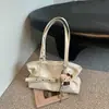 Bolsa de mano retro de nicho transfronteriza de gran capacidad, bolso de hombro casual de nicho nuevo para otoño de 2026, bolso de axila para el trabajo