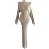 Comércio Exterior Roupas Femininas Estilo Novo Coreano Temperamento Emagrecedor Cintura Marcada Valoriza a Figura Ombro a Ombro Versátil Manga Longa Comprimento Médio Bolsa de Tricô