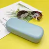 Nuevo estuche para gafas de color sólido, forma redonda-cuadrada, caja de almacenamiento para miopía, estuche para gafas unisex, estuche óptico resistente a la presión, transfronterizo