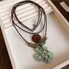 Collar de Madera con Perlas y Estrella de Mar de Cuero Vintage Ins Moda Cadena para Clavícula Versátil Cadena de Lana de Alto Sentido para Vacaciones Nicho