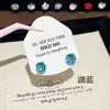 Aretes de Tachuela Hua Zi MoonlightDazzling Coloridos de Zirconia de 6MM en Aleación, Aretes de Clip Espirales Dulces y Geniales para Mujer