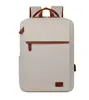 Mochila de negocios nueva, bolsa para computadora simple y casual, mochila de gran capacidad para viajes de negocios y viajes, mochila versátil de color liso